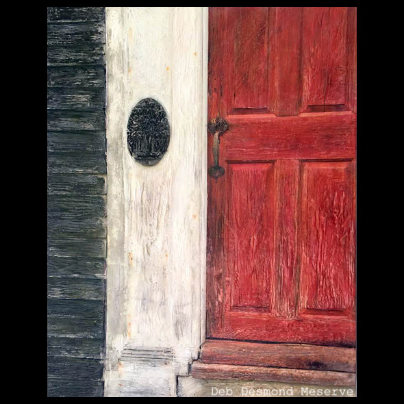 red wooden door on historic maine tavern