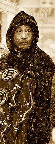 man in snow storm during chinese new year parade in boston ma